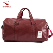 Load image into Gallery viewer, Wobag Quality Travel Bag PU Leather Couple Travel Bags Hand Luggage For Men And Women New Fashion Duffle Bag Travel 2019